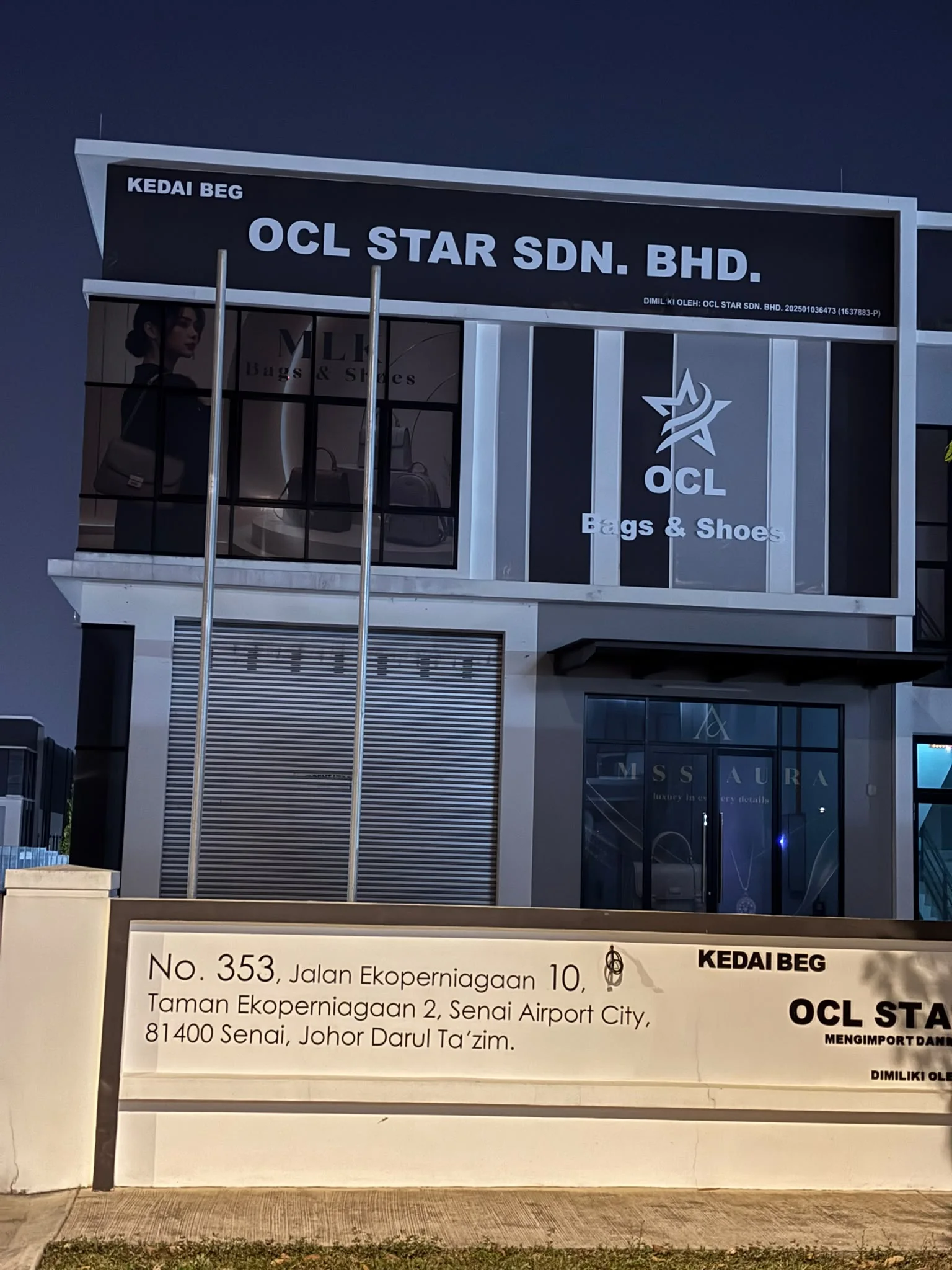 OCL STAR signage at night